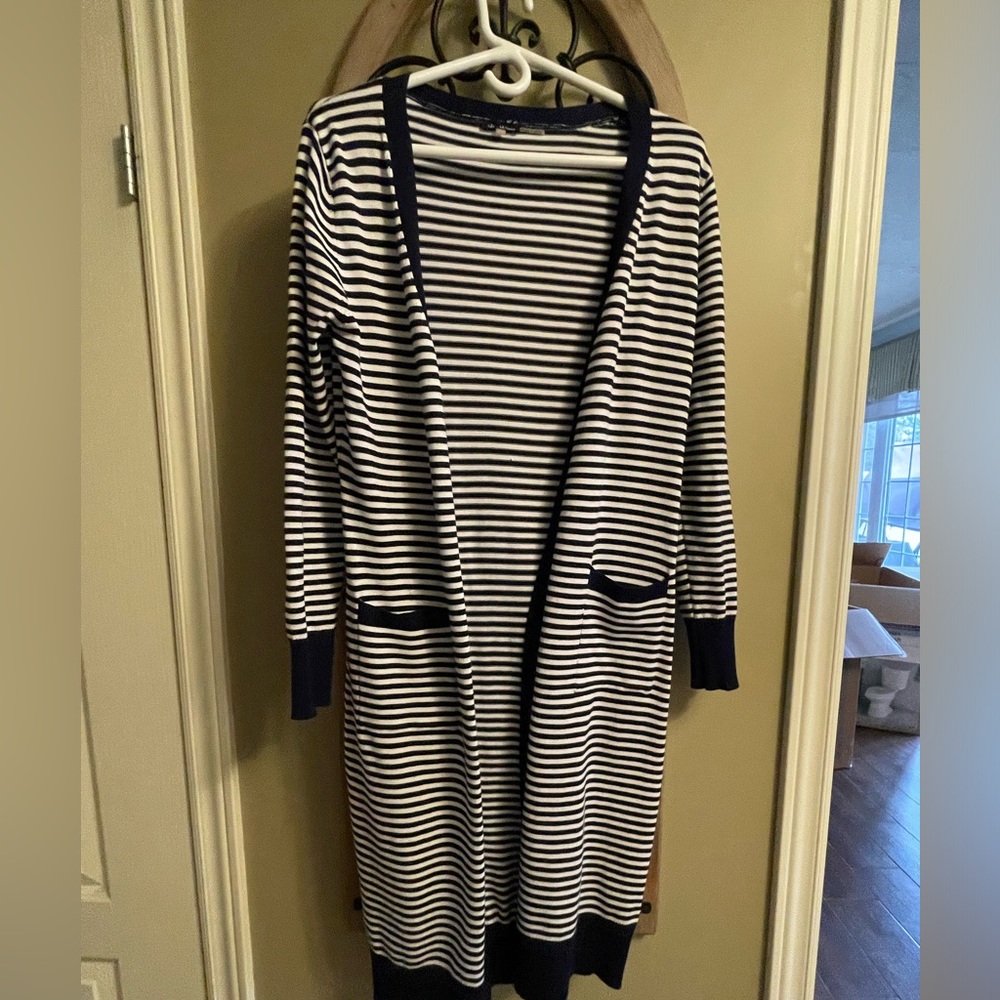 Small navy blue strip buttonless cardigan. Light weight and excellent condition.
